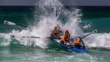 crashing through the wave